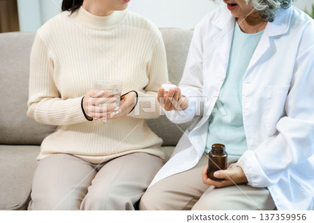 Psychiatrist comforting stressed patient during mental health therapy. Psychology counseling, emotional support, depression and anxiety treatment Psychiatrist comforting stressed patient during mental health therapy. Psychology counseling, emotional support, depression and anxiety treatment 137359956