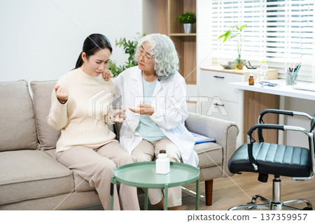 Psychiatrist comforting stressed patient during mental health therapy. Psychology counseling, emotional support, depression and anxiety treatment Psychiatrist comforting stressed patient during mental health therapy. Psychology counseling, emotional support, depression and anxiety treatment 137359957