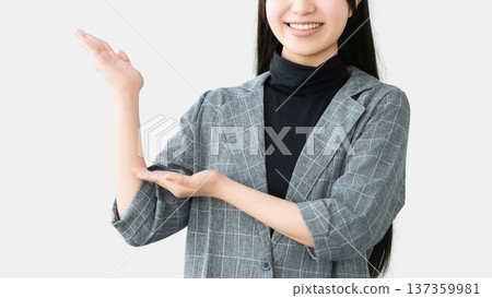 A young woman/businesswoman giving directions 137359981