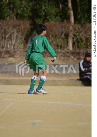 Boy playing soccer, goalkeeper Boy playing soccer, goalkeeper 137362488