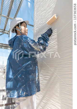 A professional woman who carefully maintains her home A professional woman who carefully maintains her home 137363658