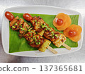 Grilled Chicken Yakitori Skewers with Teriyaki Glaze and Vegetable Garnish 137365681
