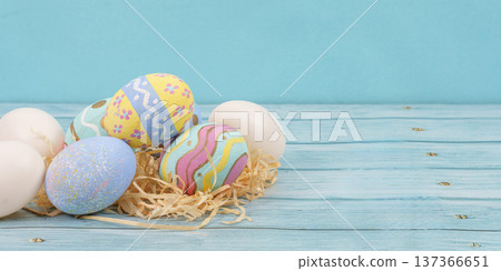 Easter eggs and decorations on wooden background 137366651