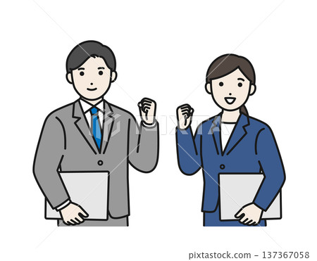 一名商人揮舞著拳頭，手裡拿著一台筆記型電腦 137367058