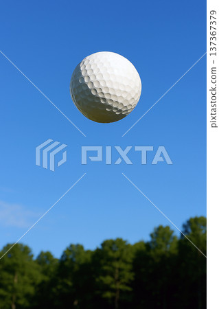 Blue sky and golf ball 137367379