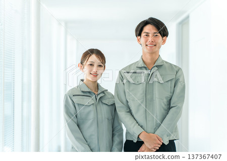 Work clothes, male and female factory workers wearing work clothes 137367407