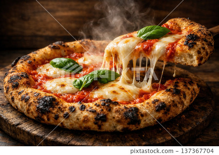 Hot Margherita Pizza with Melting Stretching Cheese and Fresh Basil 137367704