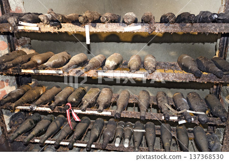 old wine bottles in a cellar old wine bottles in a cellar 137368530