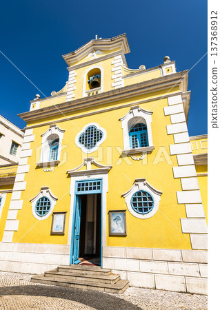 View of St. Francis Xavier's Church in Coloane, Macau. This chapel follows the baroque style of Macao's major churches. View of St. Francis Xavier's Church in Coloane, Macau. This chapel follows the baroque style of Macao's major churches. 137368912