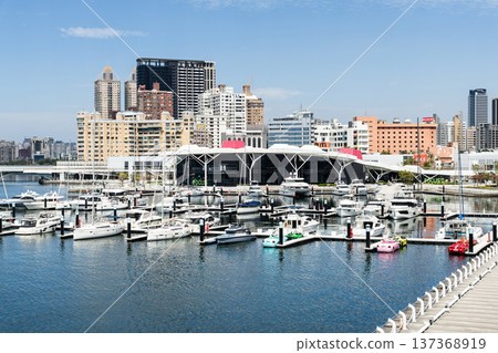 View of Argo Yacht Marina at Glory Pier of Kaohsiung Port, Taiwan. with the Coral Zone building of Kaohsiung Music Center. 137368919