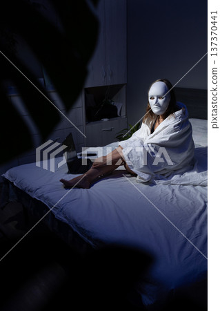 Digital Privacy Concerns in a Dark Bedroom Environment at Night 137370441