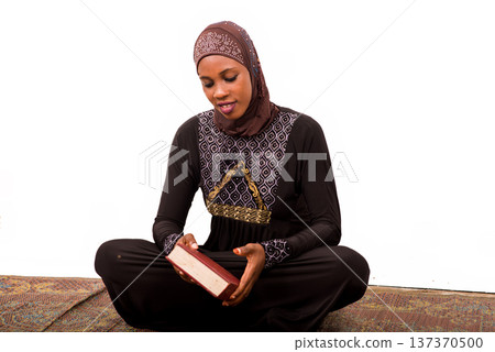 portrait of young muslim woman, smiling. portrait of young muslim woman, smiling. 137370500