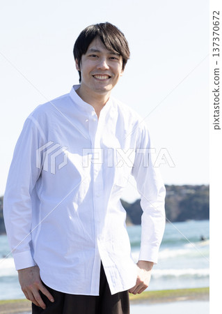 Portrait of a man in a white shirt Portrait of a man in a white shirt 137370672