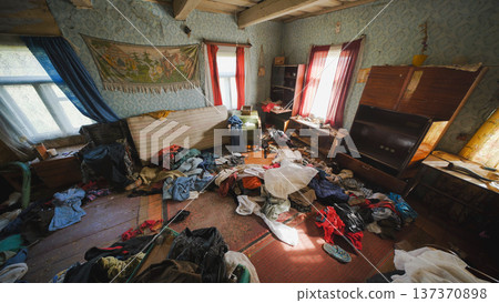 Decaying room in abandoned slavic village house showing mess and dirt 137370898
