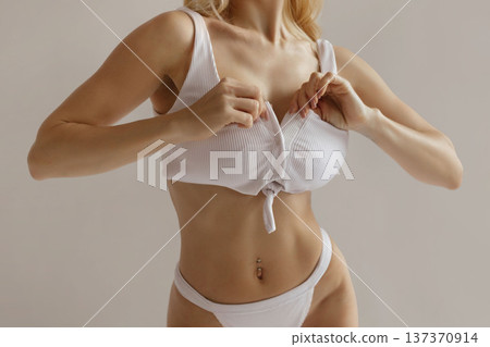Sexy beauty body care banner with fit woman in white lingerie, slim body and healthy fitness lifestyle concept with copy space Sexy beauty body care banner with fit woman in white lingerie, slim body and healthy fitness lifestyle concept with copy space 137370914