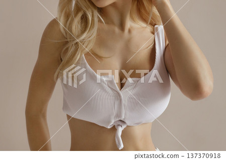 Sexy beauty concept with attractive busty woman in white lingerie, cleavage and feminine body aesthetics 137370918