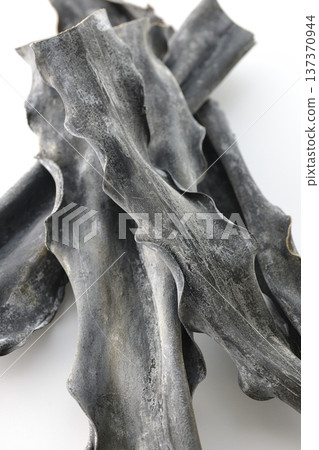 Dried kelp photographed on a white background Dried kelp photographed on a white background 137370944
