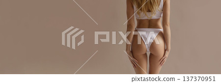 Sexy beauty body care banner with attractive woman in white lingerie from back view, skincare and wellness concept with copy space Sexy beauty body care banner with attractive woman in white lingerie from back view, skincare and wellness concept with copy space 137370951