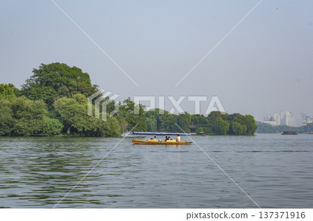 The view from a sightseeing boat around Lake West, a World Heritage Site 137371916