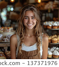 Young Woman Smiling In Pastry Shop With Cupcakes 137371976