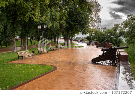 Historic Cannons Displayed Along Park Alley After Rain Historic Cannons Displayed Along Park Alley After Rain 137372207