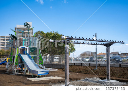 New playground equipment being installed in the park New playground equipment being installed in the park 137372433