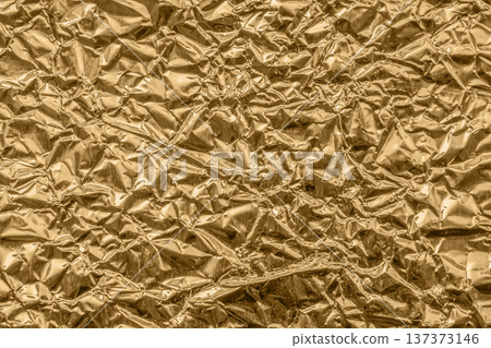 Luxury shiny metallic bronze foil crumpled texture background Luxury shiny metallic bronze foil crumpled texture background 137373146