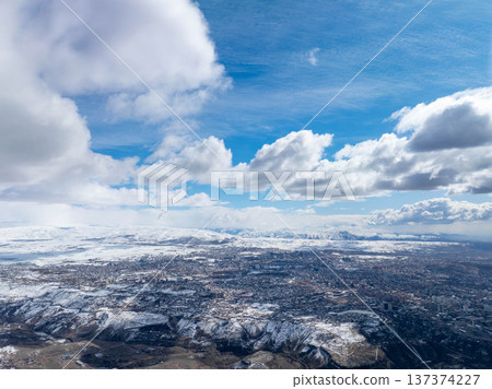 Panoramic view of snow-capped mountains under dramatic sky Panoramic view of snow-capped mountains under dramatic sky 137374227