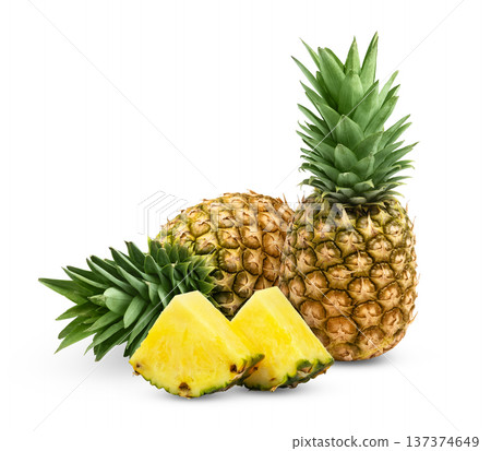 Ripe fresh pineapples and pineapple slices isolated on white background. Juicy pineapple and slice of pineapple with clipping path. Ripe fresh pineapples and pineapple slices isolated on white background. Juicy pineapple and slice of pineapple with clipping path. 137374649