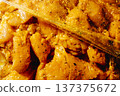 raw chicken marinating with spices in a plastic bag 137375672