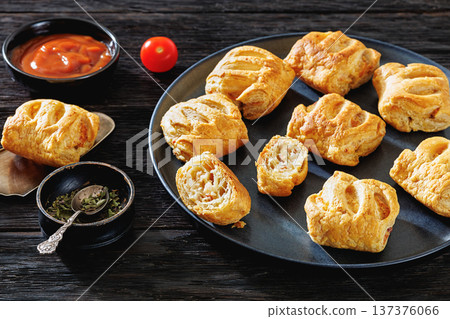 Top view of puff pastry rolls with ham and cheese Top view of puff pastry rolls with ham and cheese 137376066