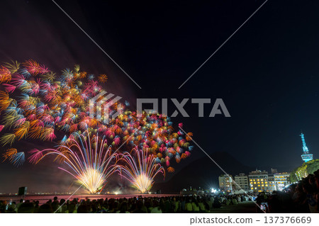 Beppu Fire Festival: Large fireworks illuminating the night sky and the landmark Beppu Tower Beppu Fire Festival: Large fireworks illuminating the night sky and the landmark Beppu Tower 137376669