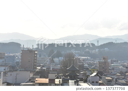 Takayama City, Gifu Prefecture, Japan - Hida Kokubunji Temple's three-story pagoda and surrounding townscape during the Takayama Spring Festival - View from a skyscraper 137377708