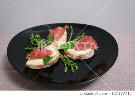 Bread prosciutto sandwich bread slice with cream cheese and prosciutto ham Bread prosciutto sandwich bread slice with cream cheese and prosciutto ham 137377713