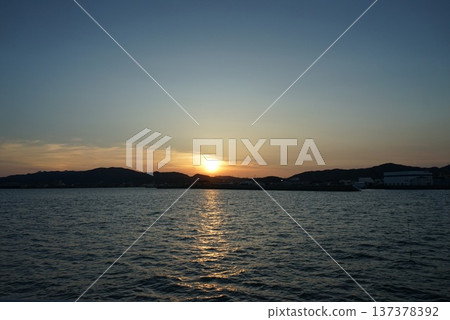 Sunset over the sea 137378392