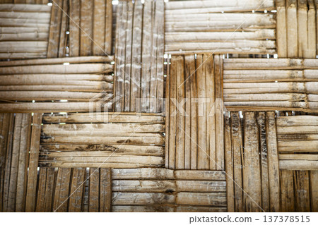 Interlocking Natural Bamboo Texture Traditional, Detailed shot of traditional interlocking bamboo weave revealing rich organic texture and craftsmanship, suitable for editorial and design use. 137378515