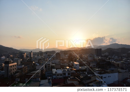 Takayama City, Gifu Prefecture, Japan - Cityscape in the city center and a beautiful sunset - Aerial view from a high-rise building Takayama City, Gifu Prefecture, Japan - Cityscape in the city center and a beautiful sunset - Aerial view from a high-rise building 137378571