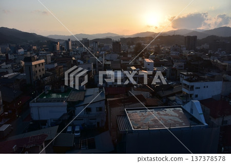 Takayama City, Gifu Prefecture, Japan - Cityscape in the city center and a beautiful sunset - Aerial view from a high-rise building Takayama City, Gifu Prefecture, Japan - Cityscape in the city center and a beautiful sunset - Aerial view from a high-rise building 137378578