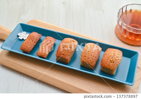 Financiers and tea at tea time Financiers and tea at tea time 137378897