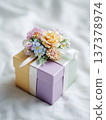 wrapped gift box with ribbon and flowers, generative ai 137378974