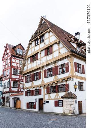 Historic Zunfthaus der Schiffleute, a traditional guildhouse in Ulm, Germany. Features half-timbered architecture with a sloped roof and decorative windows. 137379101