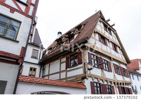 Historic Zunfthaus der Schiffleute, a traditional guildhouse in Ulm, Germany. Features half-timbered architecture with a sloped roof and decorative windows. Historic Zunfthaus der Schiffleute, a traditional guildhouse in Ulm, Germany. Features half-timbered architecture with a sloped roof and decorative windows. 137379102