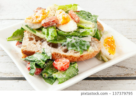 Baguette and Caesar salad Baguette and Caesar salad 137379795