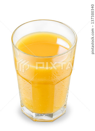 Freshly squeezed cold orange juice in a misty glass isolated on a white 137380340