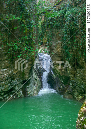 Waterfall and lake in canyon in tropical forest Waterfall and lake in canyon in tropical forest 137380388