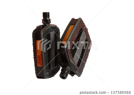 Black bicycle pedals with reflectors. 137380568