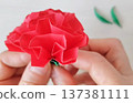 Making carnation origami 137381111