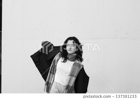 A young teenage girl, a student, dressed in casual clothes. 137381233