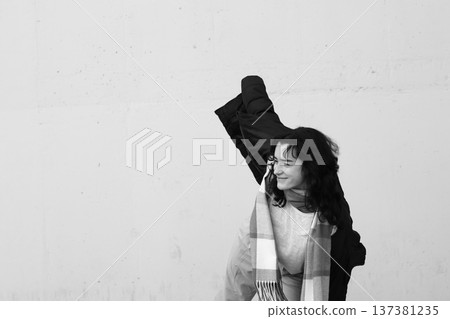 A young teenage girl, a student, dressed in casual clothes. 137381235