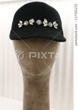Close-up of a sleek mannequin head in a retail store. 137381272